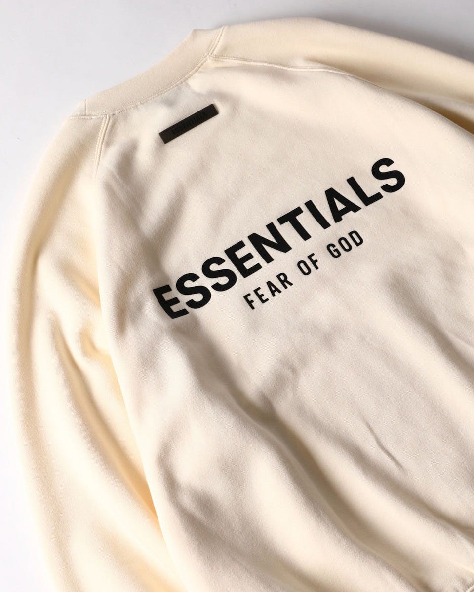 fear of god essentials hoodie price